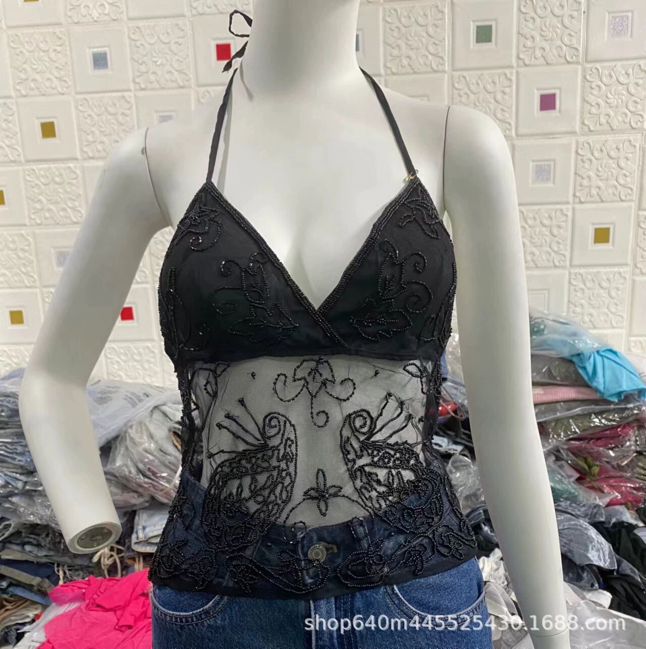 Ropa de mujer de color sólido vestido bajo precio chaqueta de emoción cinturón sexy hueco comercio exterior transfronterizo fuente de mercancías al por mayor