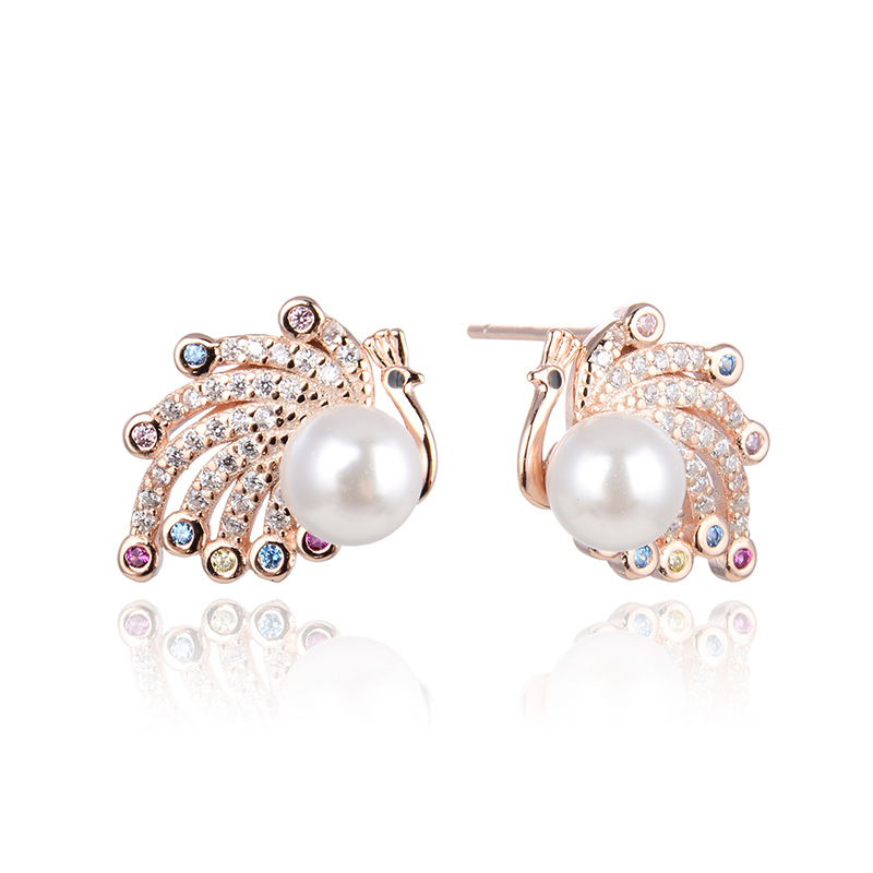 S925 plata esterlina Pavo Real perla pendientes para las mujeres al por mayor diseño de moda sentido nicho temperamento ZIRCON rebordear pendientes