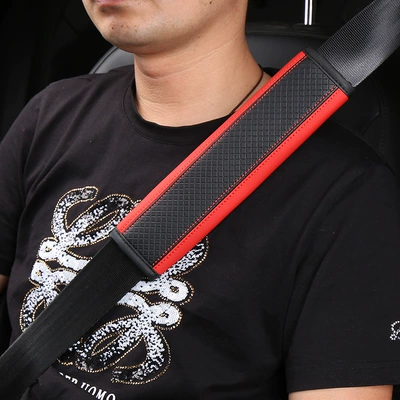 Seat belt shoulder pad — interior safety belt sheath
