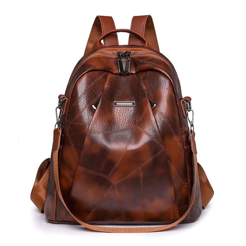 2024 nueva mochila de cuero suave casual para mujer moda retro multifuncional anti-salpicaduras mochila de viaje al por mayor