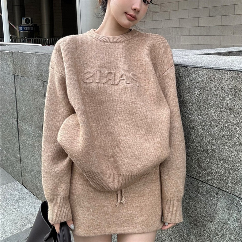 Cross-border set with embossed lettering, long-sleeve pullover sweater for women, spring and autumn knitted short skirt, casual two-piece set wholesale