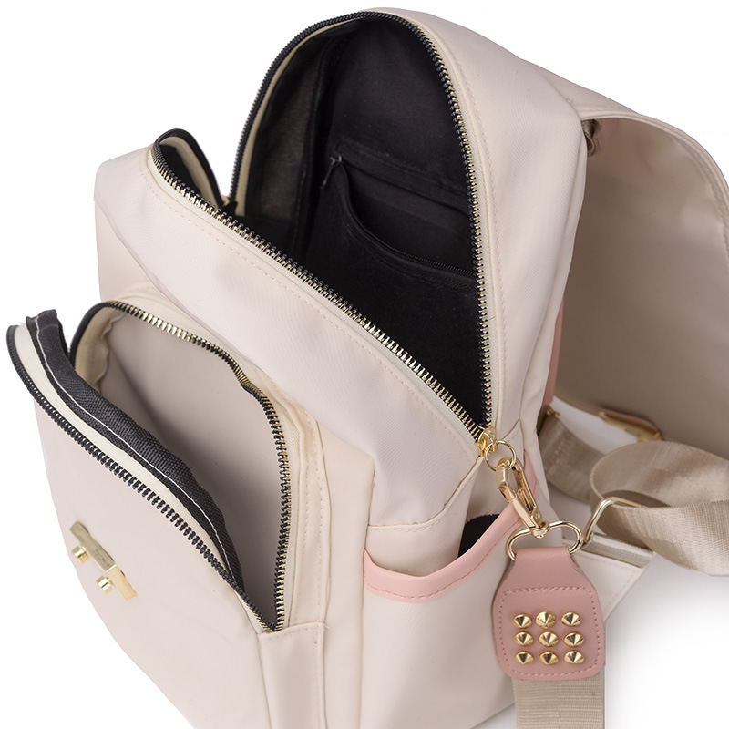 Bolsos mujer 2023 nueva mochila antirrobo coreana moda femenina todo fósforo nicho color de contraste mochila de viaje al por mayor