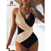 连体式泳衣女撞色交叉性感深V显瘦遮肚ins风温泉度假跨境泳装