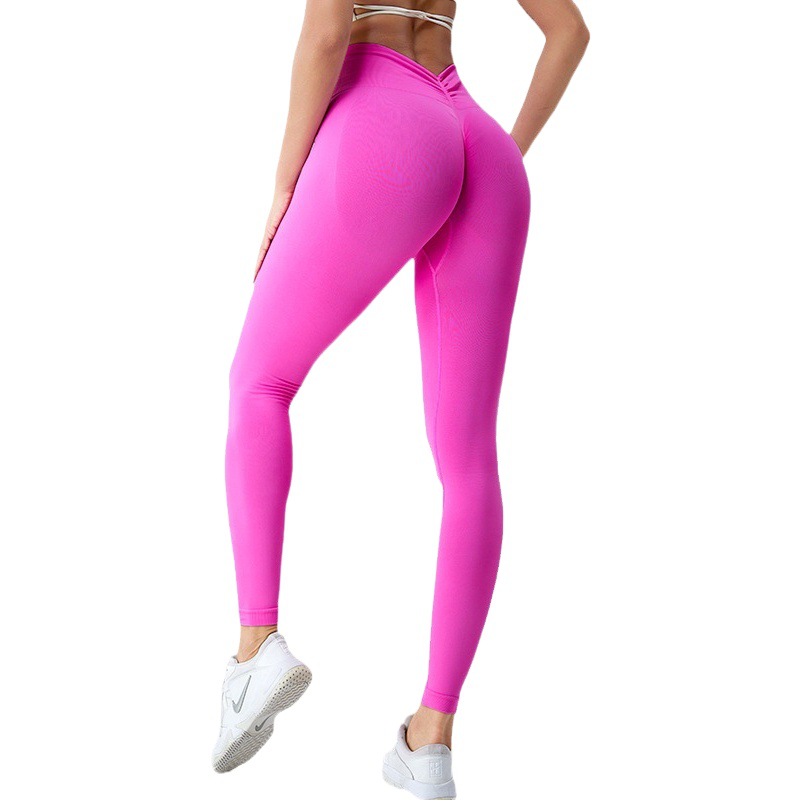 Europa y América nuevos pantalones de fitness para correr al aire libre de las mujeres de melocotón levantamiento de cadera sin costuras medias deportivas cintura alta pantalones de yoga de secado rápido