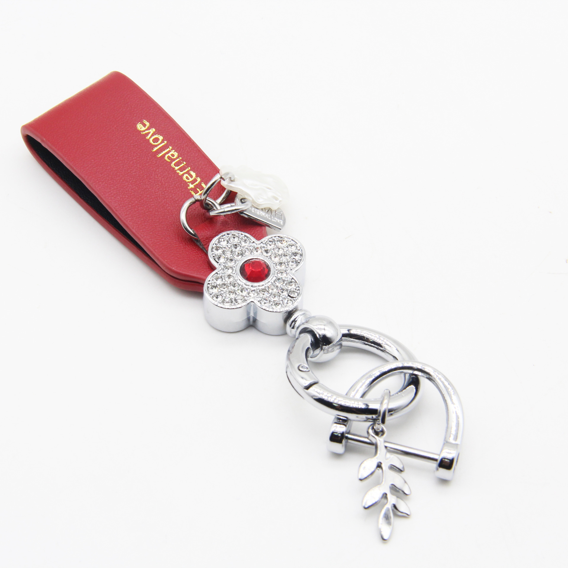 Trébol de estilo francés llavero de coche de piel de oveja llavero de alta gama personalizado simple colgante de flor de diamante de las mujeres