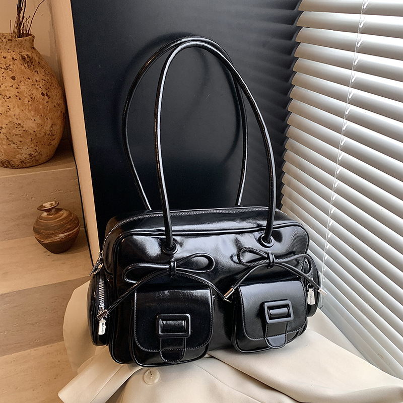 Bolsa de brazo coreana de arco de gran capacidad de moda extranjera bolso de hombro de viaje diario bolso de nicho de diseño