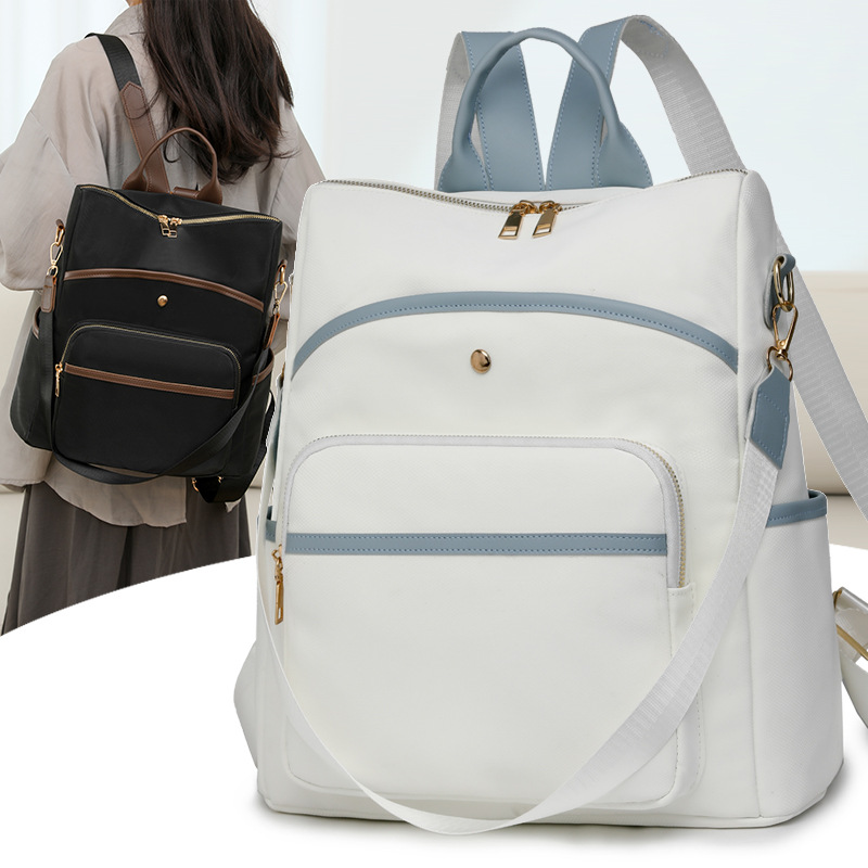 Mochila para mujer Mochila multiusos simple de gran capacidad Color sólido Moda ligera Bolsa de cuero de viaje al por mayor