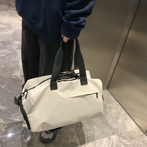 Trendy brand portable short-distance travel bag, women's fashionable travel bag, men's street trend crossbody large-capacity travel bag