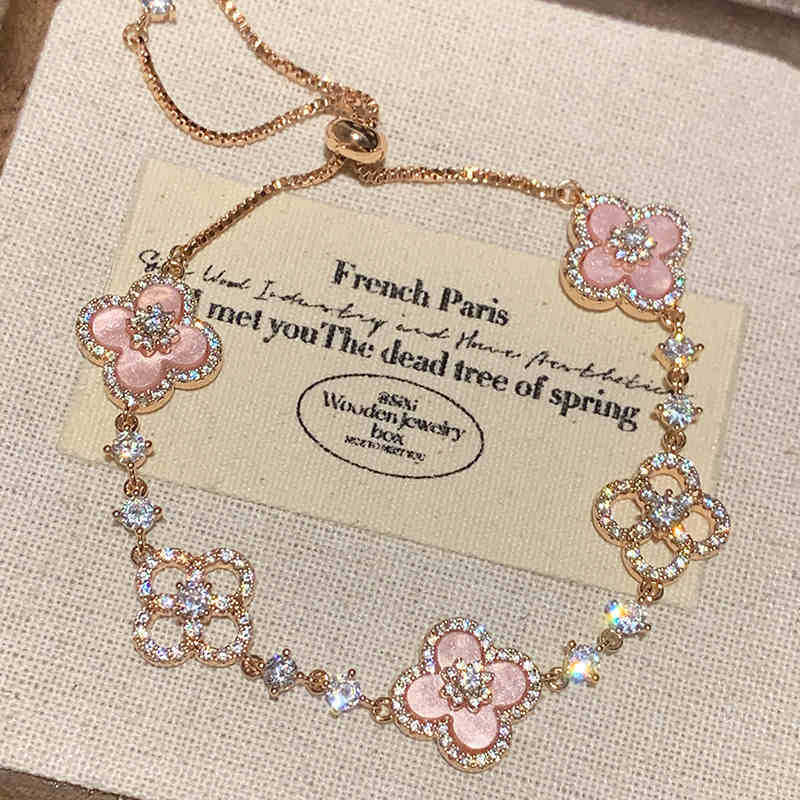 Pulsera de flores huecas en forma de diamante de circón, pulsera de temperamento de lujo ligero, personalidad, moda exquisita, joyería de todo fósforo para mujer