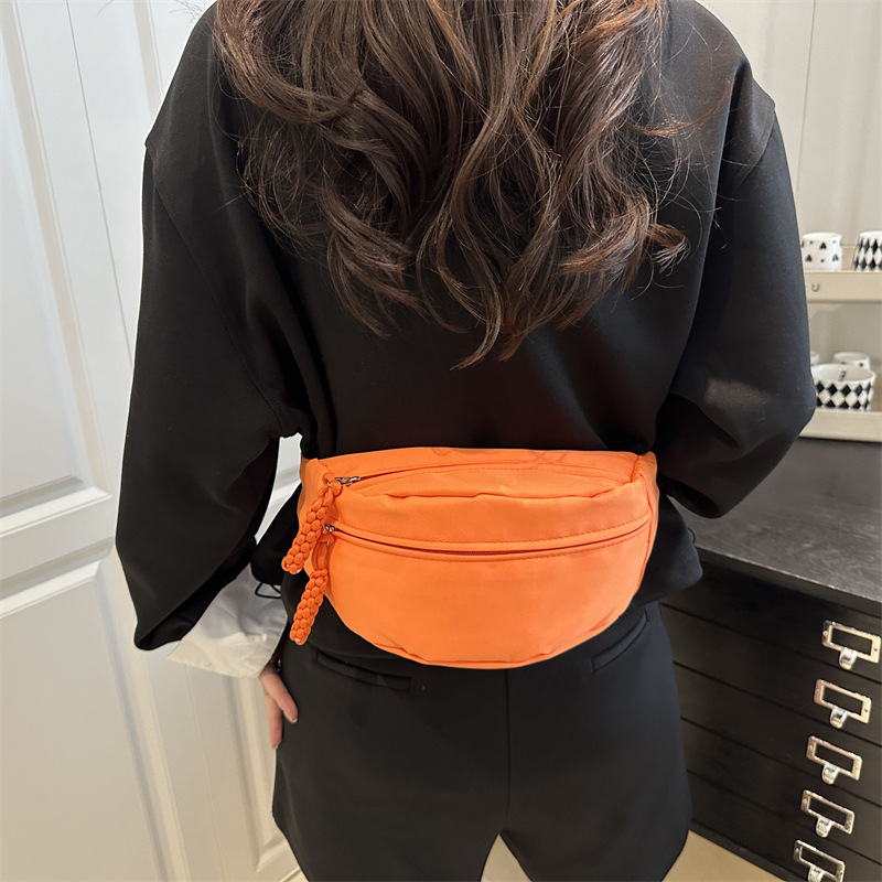 Bolso de hombro casual de lona 2026 verano nuevo estilo de tramo oblicuo bolso de pecho deportivo simple versátil bolso de moda de mujer