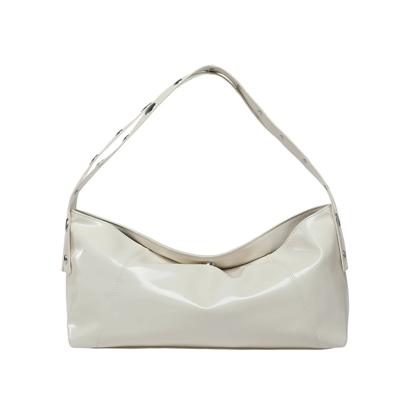 Bolso de axila retro estilo Hong Kong 2025 verano nuevo bolso femenino bolso de textura de alta calidad bolso de hombro con remaches de gran capacidad