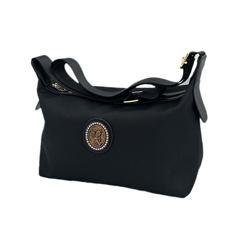 Bolso de mujer de alta calidad universal, nuevo estilo de moda, simple, ligero, elegante, mochila de hombro, mochila de trabajo casual.