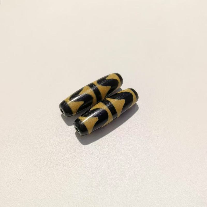 メーカー歯黄包糊九眼12 × 38mm天珠歯黄風化古法包糊瑪瑙天珠【a級】|undefined