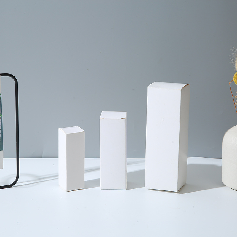 Caja de embalaje de papel Kraft rectangular cosméticos productos para el cuidado de la piel caja de embalaje al por mayor engrosada Tarjeta blanca y negra Cartón plegable