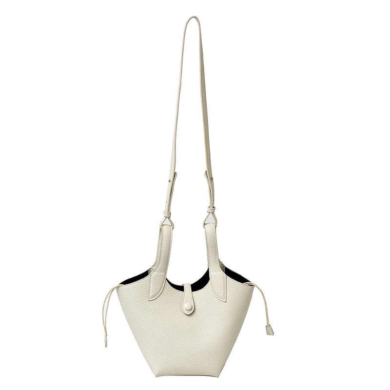 Bolsa de axila de textura de nicho Bolsa de mujer 2025 primavera nuevo bolso de cubo bolso de canasta de mensajero de un solo hombro simple