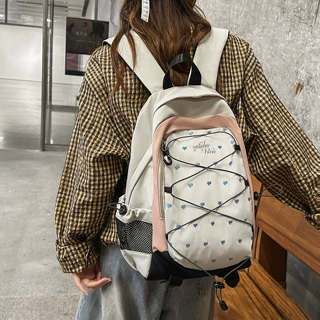小清新波点书包高颜值男女初高中生休闲双肩包外出百搭旅游运动包