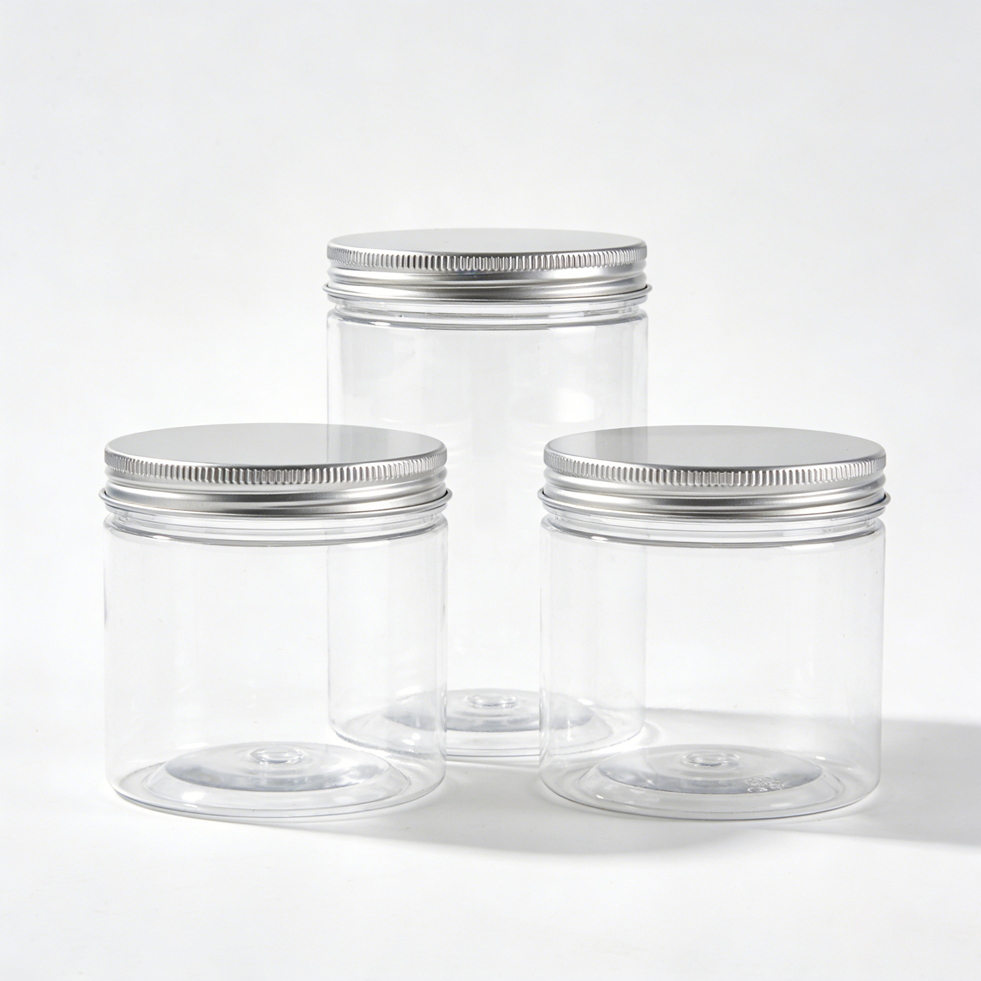 Los fabricantes venden al por mayor latas de plástico transparentes, botellas selladas de nueces de té, latas selladas de almacenamiento de boca ancha, botellas de plástico en stock image 5