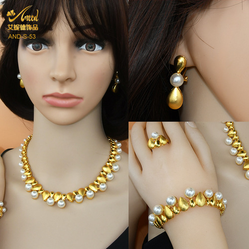 Set of Four Women's Wedding Jewelry for Dubai: Diamond, Pearl Necklace, Ring, Earrings, and Bracelet for Formal Occasions