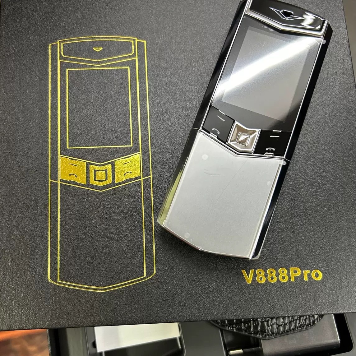 V888pro跨境新款外贸手机2G非智能按键滑盖老人学生功能备用手机