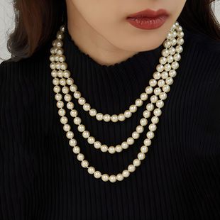 Retro pearl necklace actress elegant temperament small incense wind wind bangs two -layer collarbone versatile long sweater chain cross -border accessories