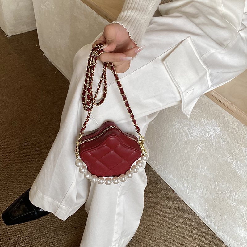 Bolsa de perla de bordado de diamante, mini bolso pentagonal, nuevo bolso infantil transfronterizo.