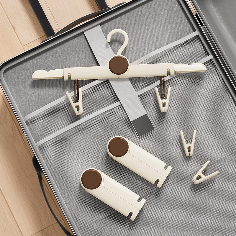 Retractable multifunctional clothes hanger for home use, non-slip, non-marking, with clips for drying pants, wardrobe storage tool, wholesale from manufacturer Retractable multifunctional clothes hanger for home use, non-slip, non-marking, with clips for drying pants, wardrobe storage tool, wholesale from manufacturer