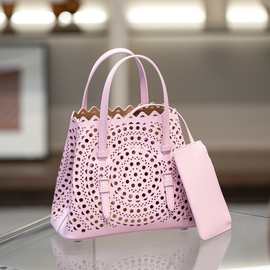 2025夏季新款小牛皮波浪镂空雕花菜篮子牛皮托特包包编织包手提