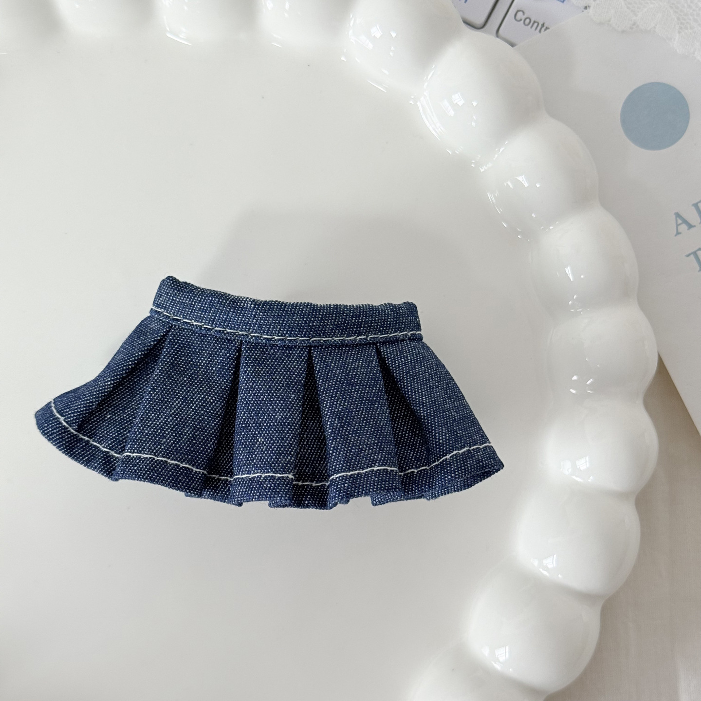 Denim racer pleat skirt