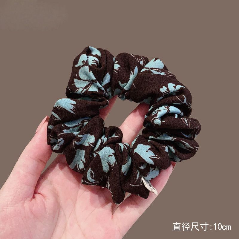 Cuerdas de cabello de viento pastoral pequeñas y altos valores faciales, anillo de cabello de intestino grande, sensación de una niña de banda de goma flácida, cuerdas de malla de banda de bola de cabeza