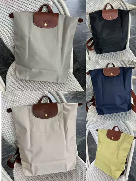 Longxiang's new large backpack is a nylon double-shoulder bag with genuine leather accents, large capacity, foldable, waterproof, and suitable for casual travel