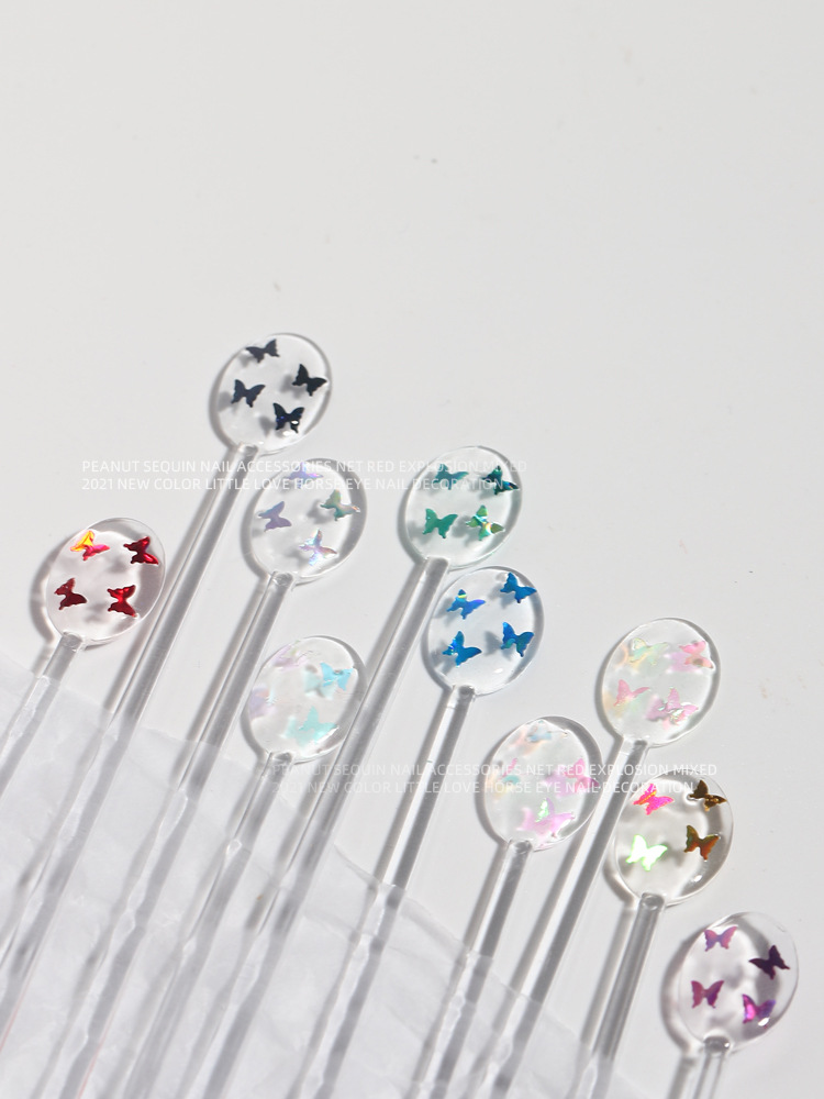Celebridad en línea láser mariposa lentejuelas nuevo Ojo de caballo rectangular ultra-delgada magia flash uñas joyería 12 colores mezclados traje