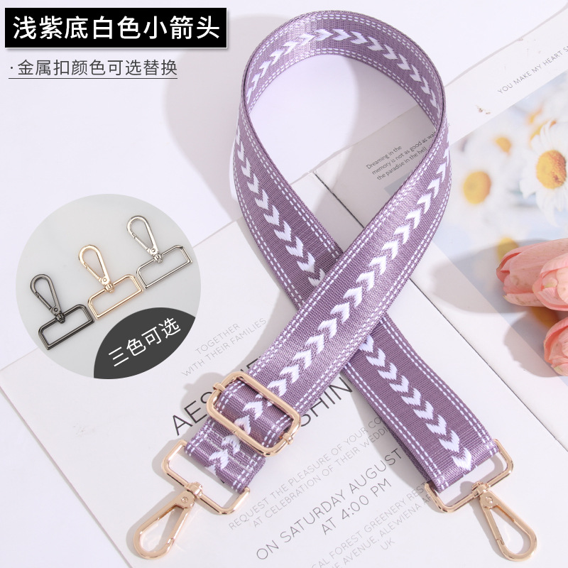 Small white arrow on light purple background