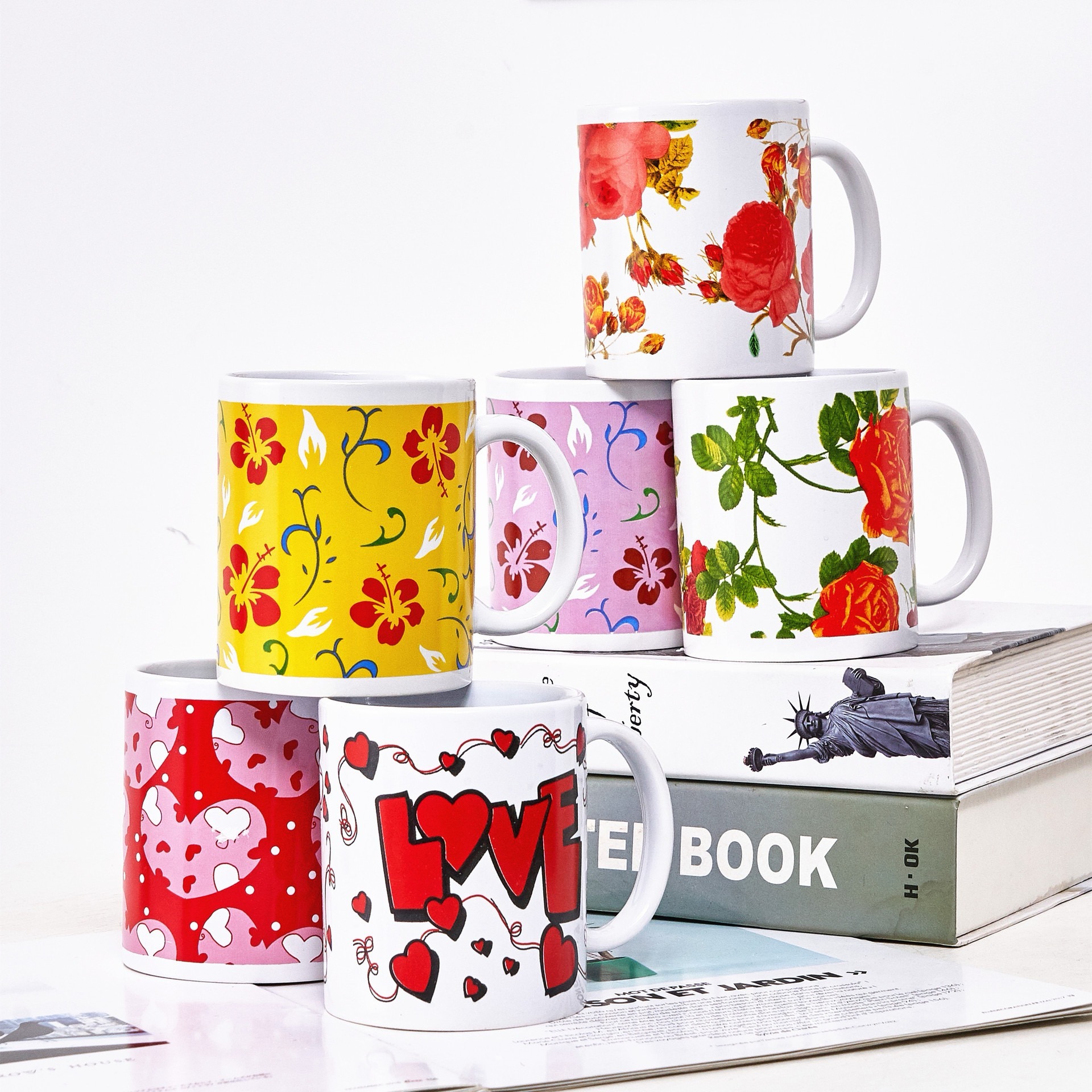 Tazas de agua de cerámica personalizadas logotipo de impresión publicitaria regalos de color tazas en blanco exportación de comercio exterior