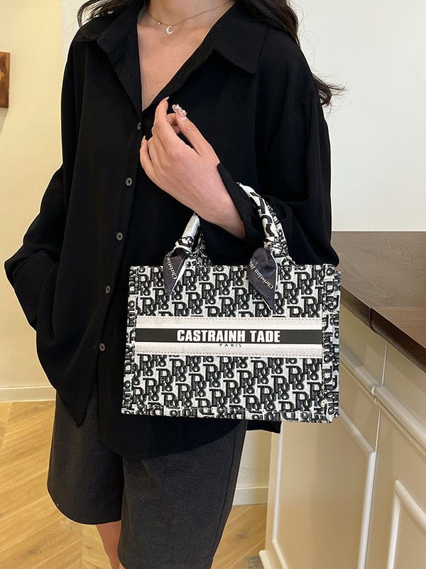 Bolso de gran capacidad para mujeres 2025 nueva moda transfronteriza letras bordadas bolso de mano bolso de mano bolso de brazo de hombro universal