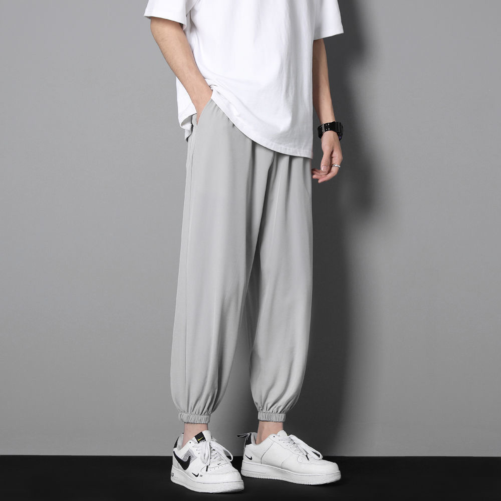 Pantalones casuales de otoño para hombres sueltos rectos versátiles pantalones cortos de moda de los hombres coreanos deportivos para estudiantes pierna ancha de los hombres