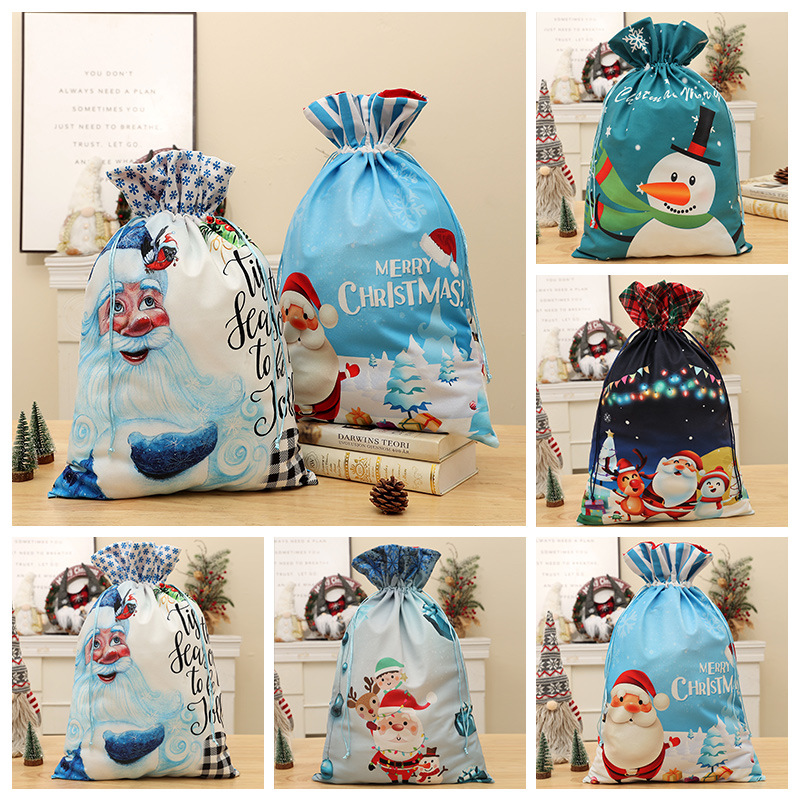 Cross-border new Christmas gift bag blue printed striped drawstring children's candy bag Santa gift bag