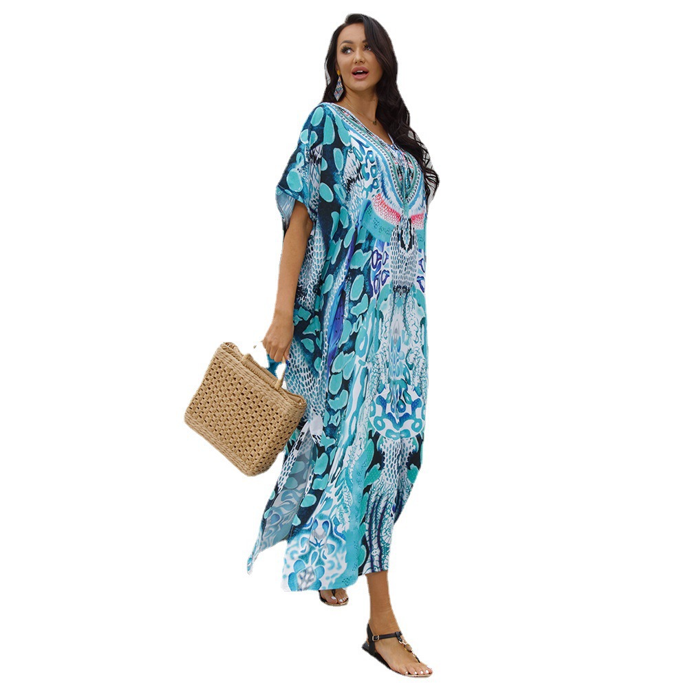 Blusa de playa de cuatro lados elástico impreso playa protección solar camisa traje falda de vacaciones bikini blusa europea y americana 5D35