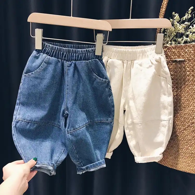 Primavera y otoño nuevos bebés de moda jeans casuales para niños pequeños y medianos pantalones de rábano de estilo extranjero pantalones largos de Harlan