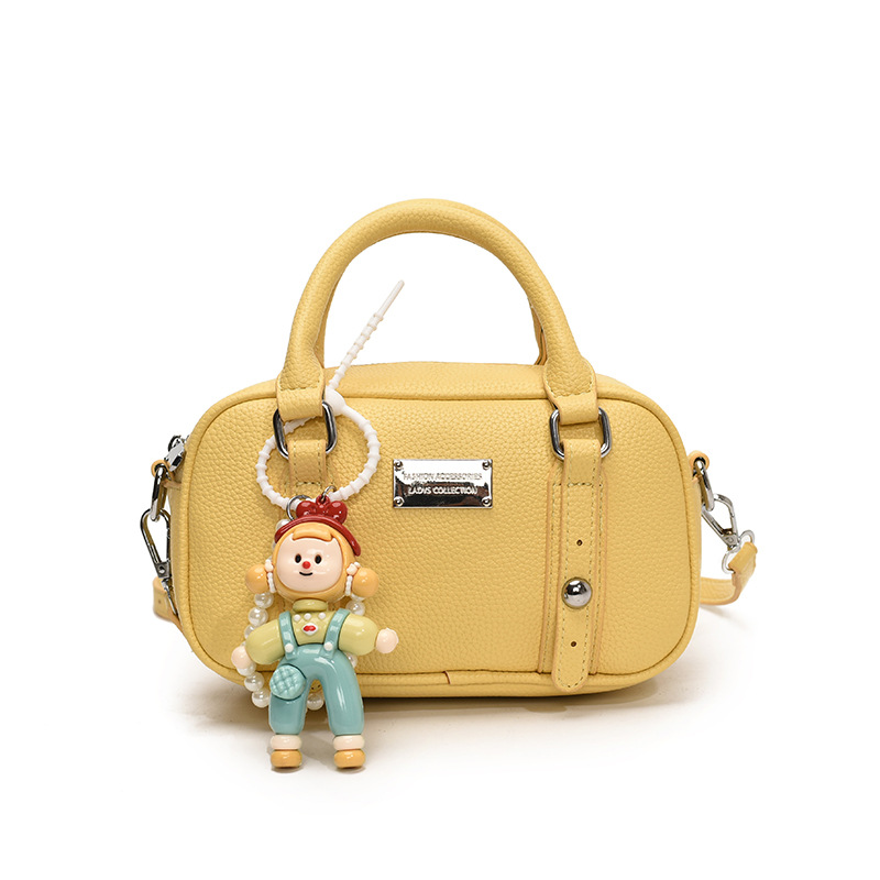 Bolso de bolera de mano de estilo explosivo para mujer 2025 nuevo bolso de hombro de estilo occidental de todo fósforo bolso de mensajero de paso de moda de alta gama