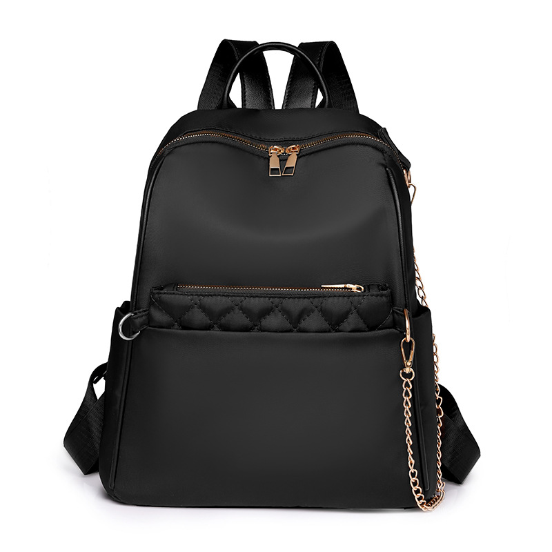 2024 otoño nueva cadena de moda para mujer mochila de nailon simple y versátil mochila de viaje ligera al aire libre marea