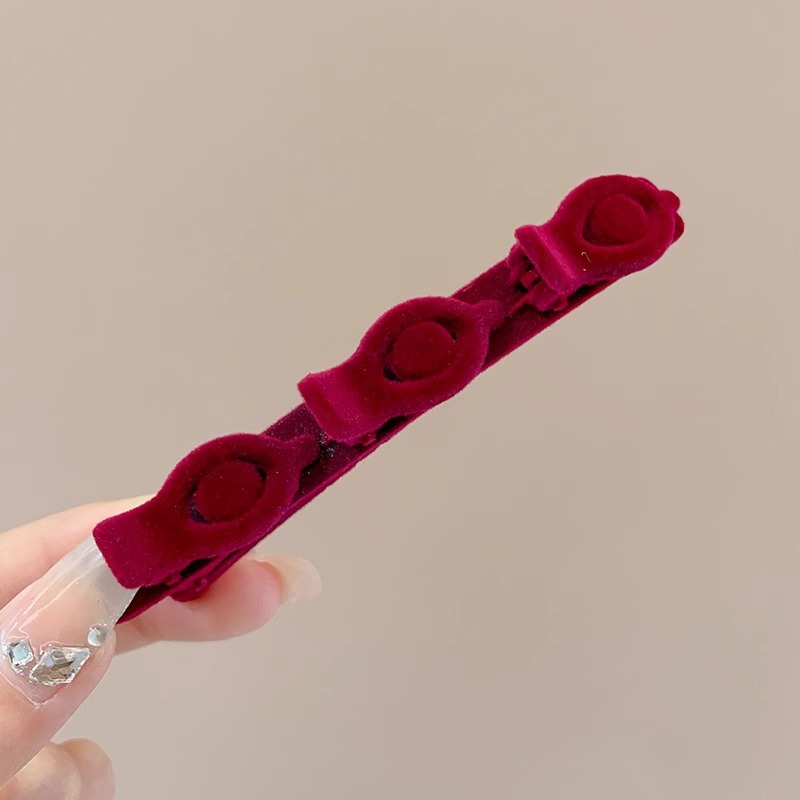 Niños de Año Nuevo acabado de cabello roto artefacto de otoño y invierno flocado rojo amor trenzado clip de cabello para mujeres flanqueado clip