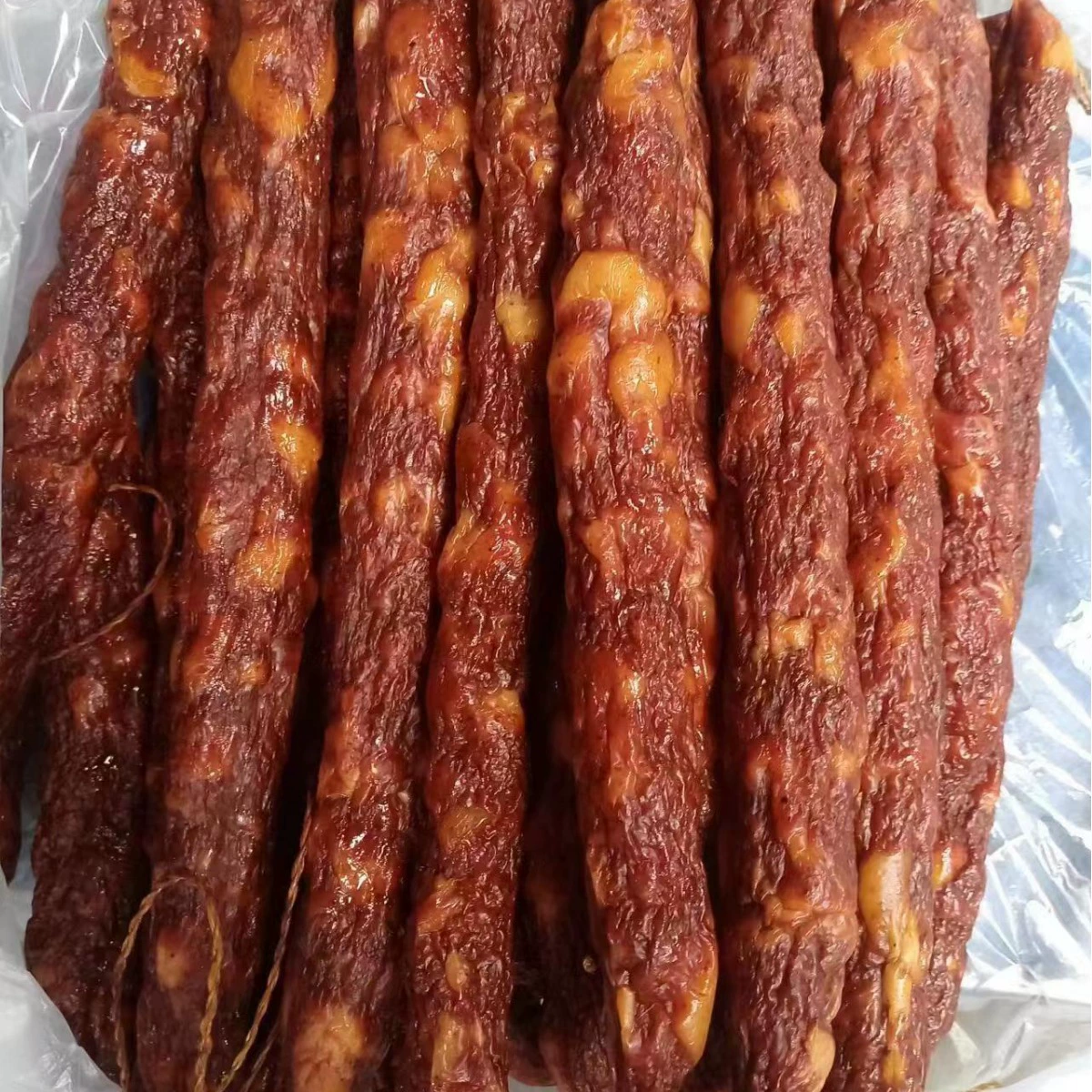 Колбаса, пряная колбаса Сычуань, популярная специальная кантонская колбаса, высушенное в воздухе копченое бекон Сычуань, вкусное