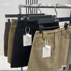 コーデュロイのスカートの半身のスカートの女性の秋冬の小さい背は合わせて腰が高くて痩せています。