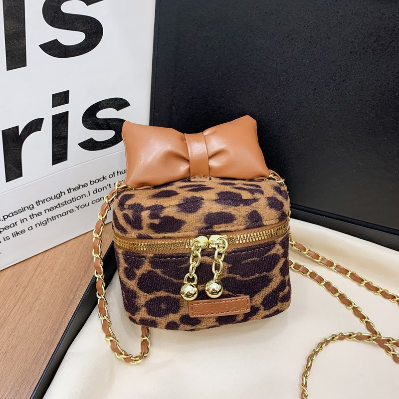 Bolsos para niños de nuevo estilo Bolsos de hombro para niños y niñas con estampado de leopardo de moda coreana Bolsos de mensajero de cadena de bebé con lazo de estilo occidental