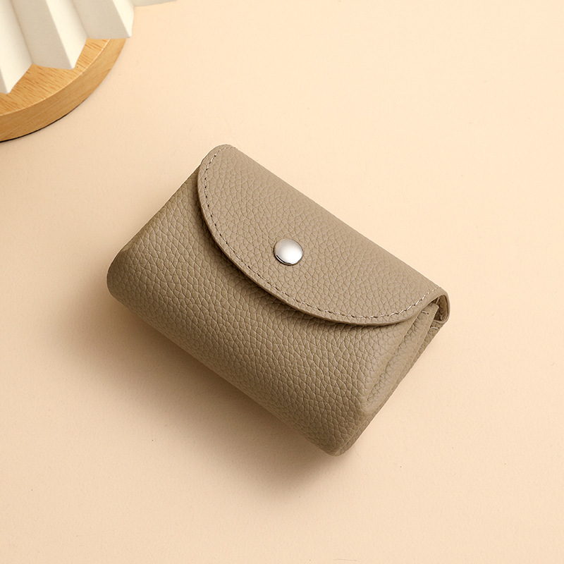 Japón y Corea del Sur creativo pu lichi piel billetera corta monedas lindas billetera de cambio doble capa pu mini billetera para mujeres