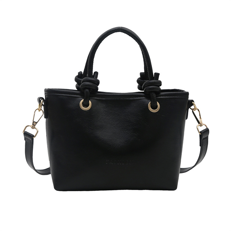 Bolso de moda simple 2025 primavera nuevo retro textura bolso de cubo de moda color sólido viaje mochila de hombro