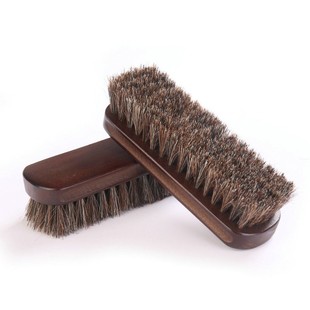 Shoe brush + shoe polish