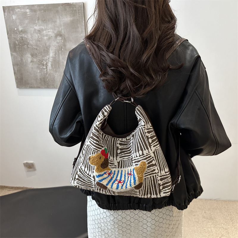 Casual bolso de gran capacidad a cuadrillas mujeres 2024 nuevo estilo popular crayón perro mochila de hombro bolso de hombro