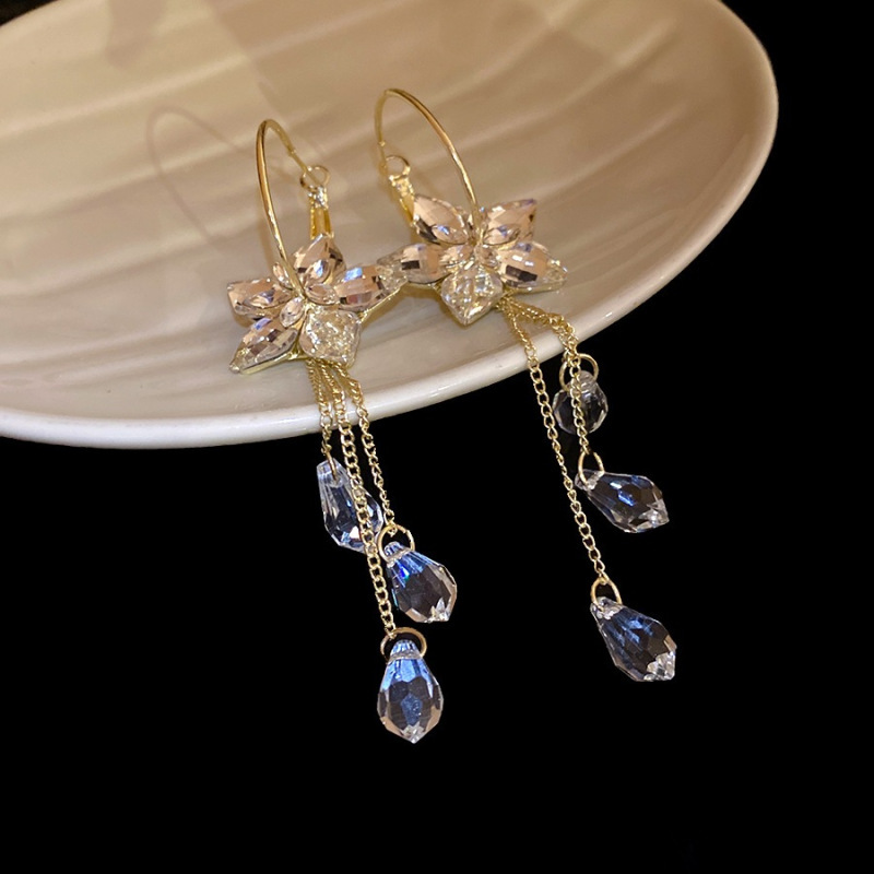 Pendientes de flor de lazo elegante de súper hada de plata Pendientes de moda de lujo ligero francés Pendientes de todo fósforo dulce de estilo literario