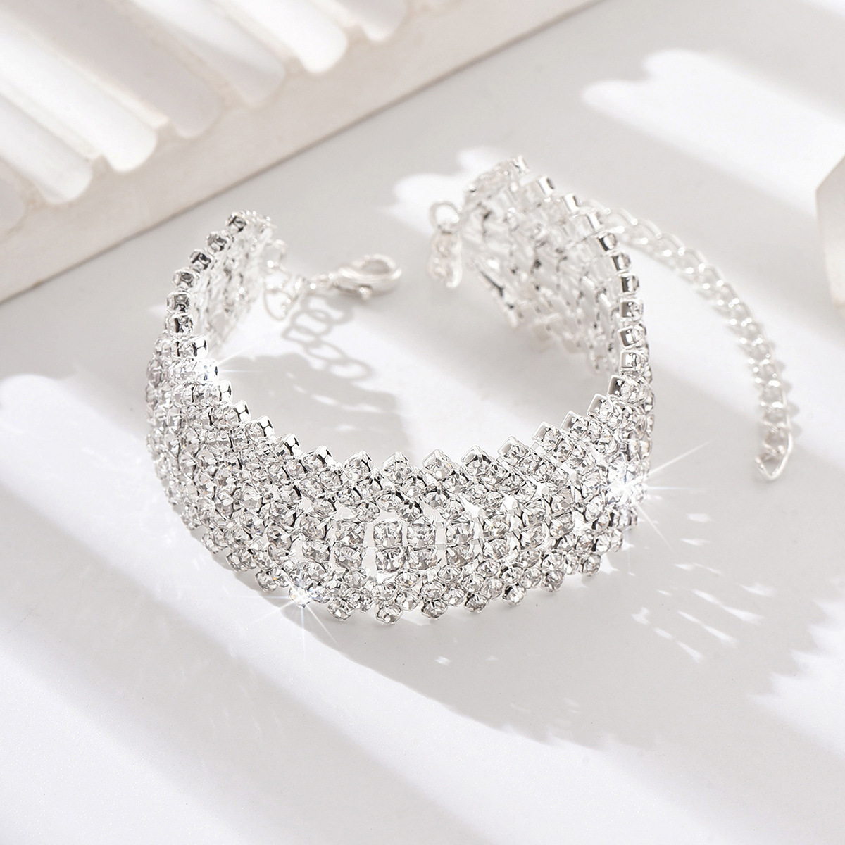 Europa y los Estados Unidos ligero lujo joyería de tobillas de garra de moda de playa multifacé super brillante multicapa de diamantes completos accesorios elegantes simples para mujeres